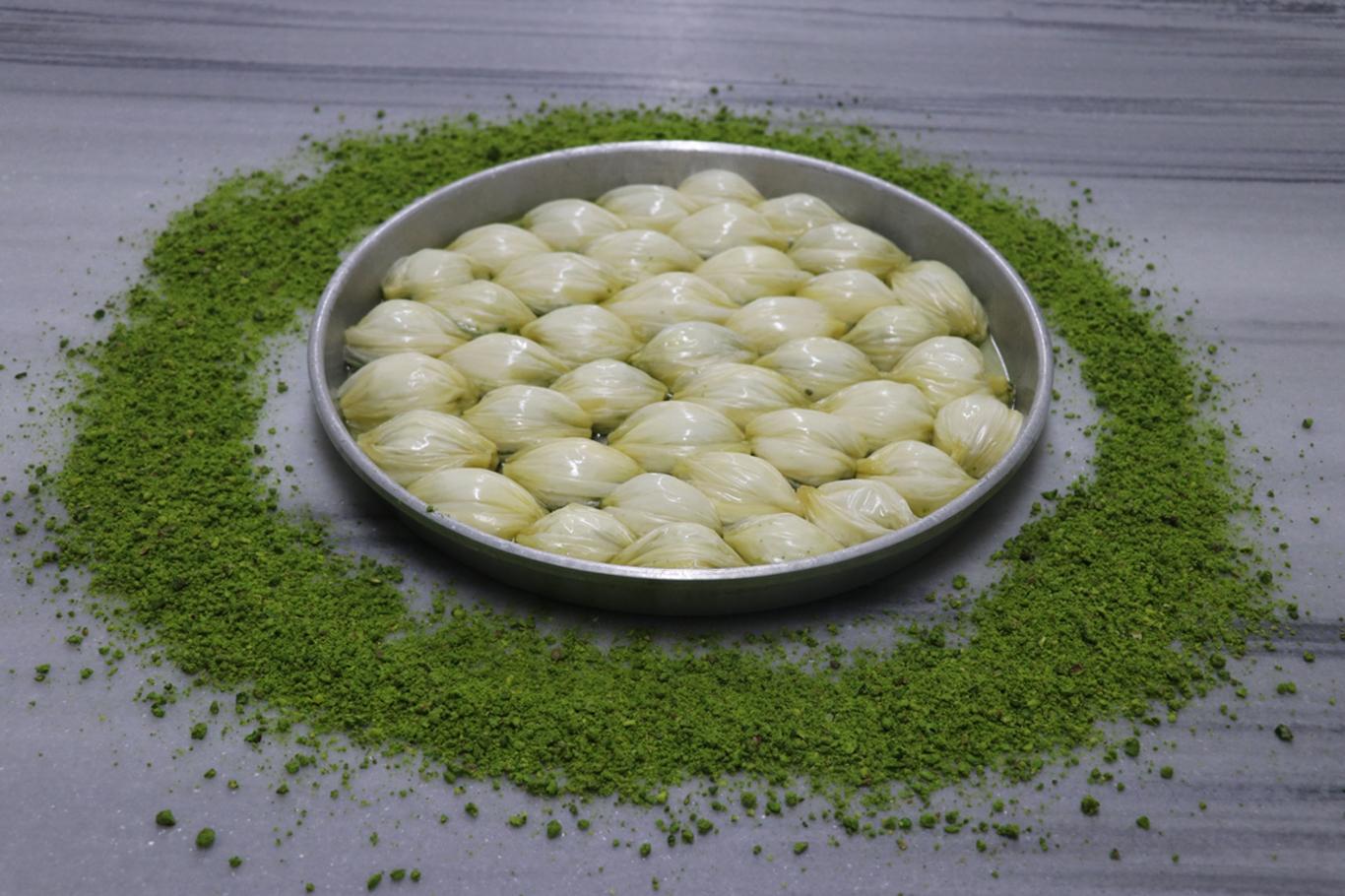 Midye şeklindeki baklava büyük ilgi görüyor Midye şeklindeki baklava büyük ilgi görüyor